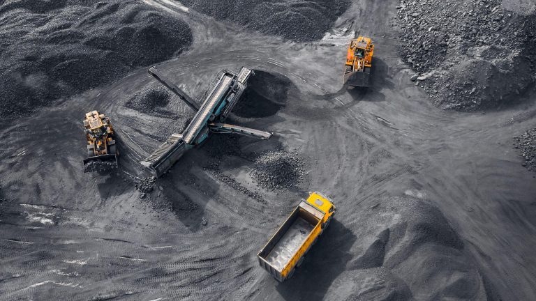 2CGRA6F Open pit mine industry, big yellow mining truck for coal, top view aerial drone